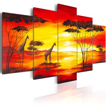 Canvas Print - Giraffes on the background with sunset